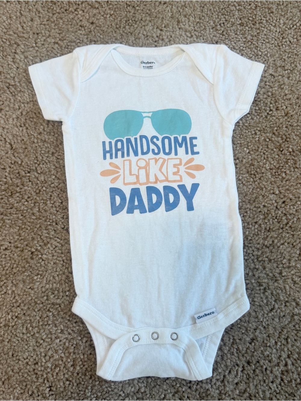 Gerber White One-Piece with Teal, Blue & Peach 'Handsome Like Daddy' Graphic